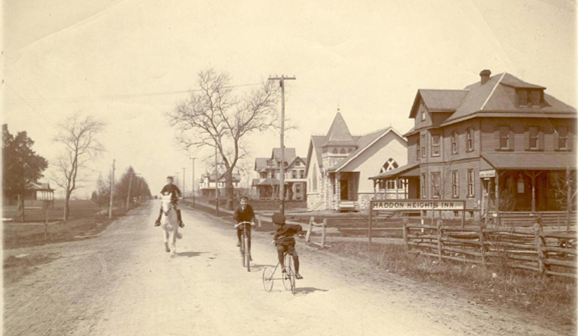An early photograph of White Horse Pike with cyclists and the Haddon Heights Inn